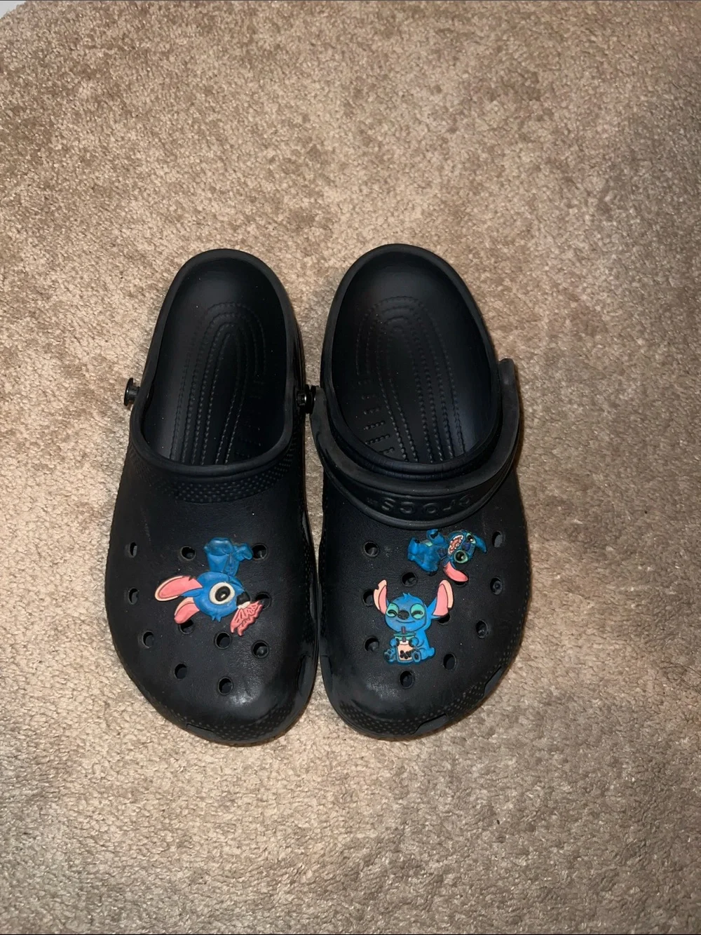 CROCS & Jordan’s both sz7  Black Clogs with Blue and Pink Stitch Charms
